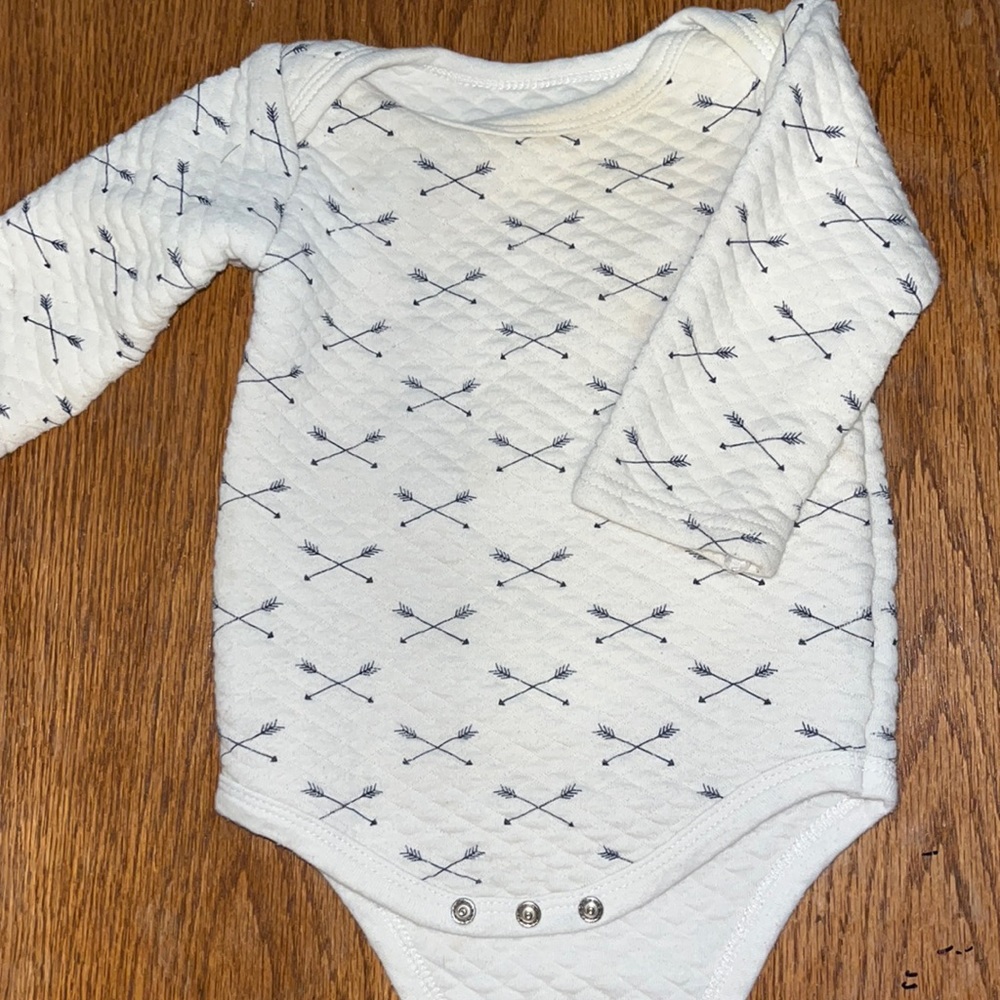 Quilted long sleeve onesie with navy arrows